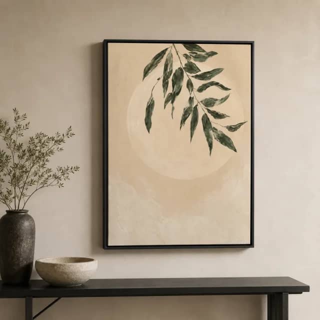 Quiet Olive Shadow in a black frame above a dark console in a calm entryway