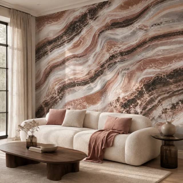 Dusty rose marble wallpaper installed behind a white sofa in a modern living room