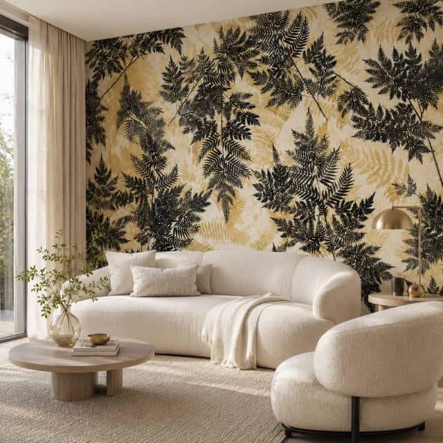 Charcoal gold fern wallpaper installed in a calm modern living room