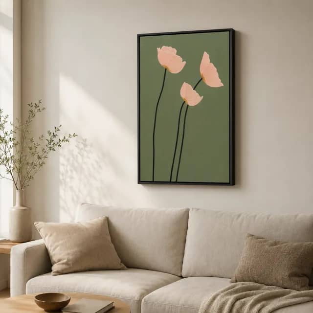Olive Bloom Whisper in a black frame above a linen sofa in a calm living room