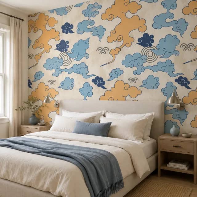 Blue orange cloud wallpaper installed behind a bed in a calm bedroom