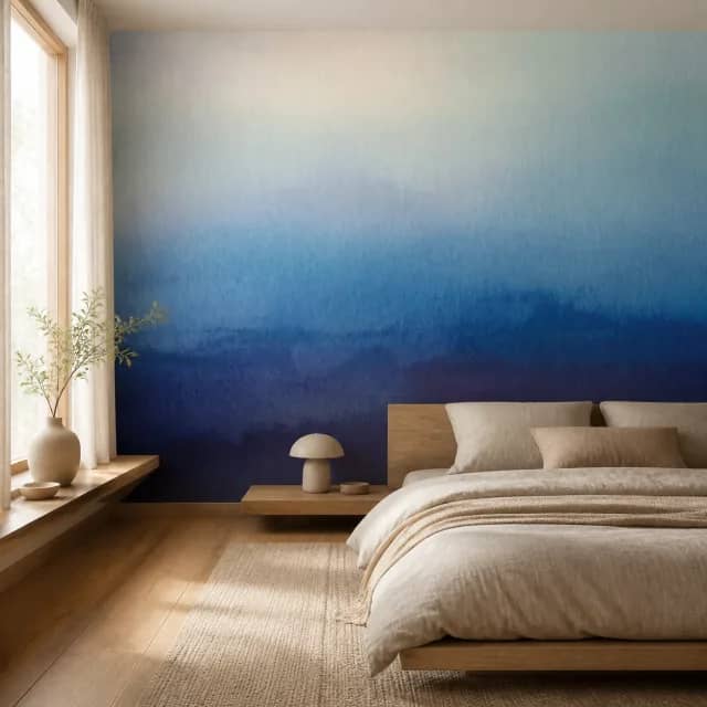 Blue gradient mural in a calm contemporary bedroom
