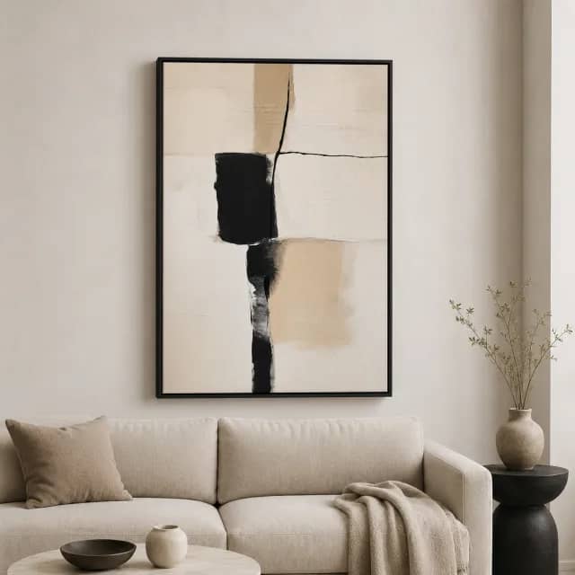 Stillness of the Black Line displayed above a light sofa in a neutral living room