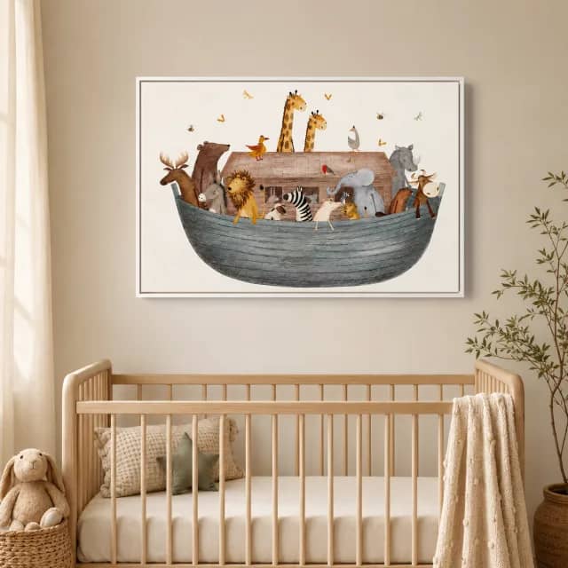 Little Friends Ark in a white frame above a pale wooden nursery crib