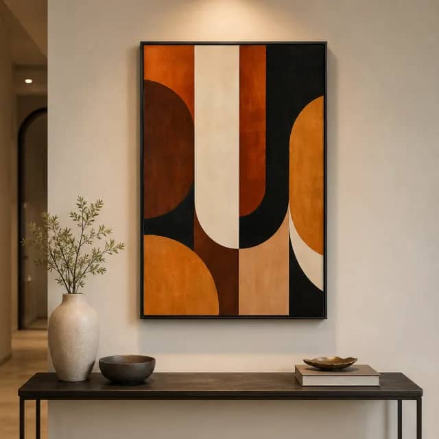 Amber Arch in a black frame above an elegant console in a modern entryway