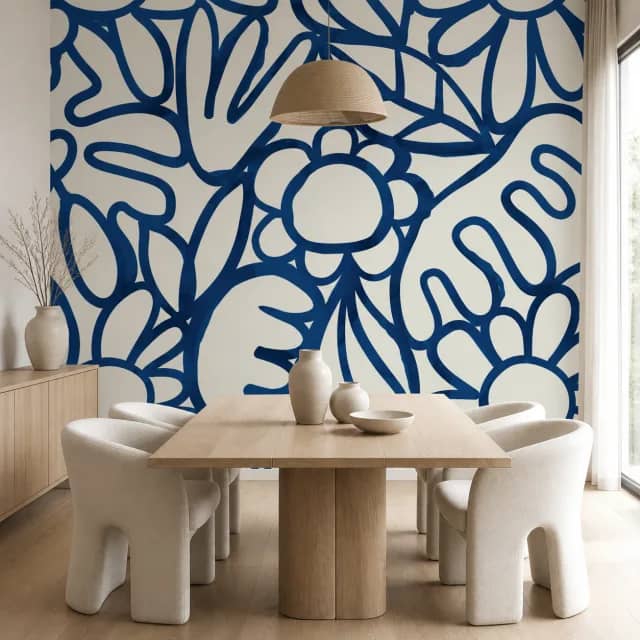Contemporary dining room with bold blue botanical wallpaper