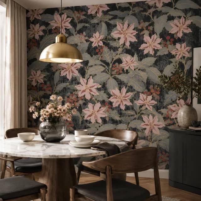 Charcoal floral wallpaper installed behind an elegant marble dining corner