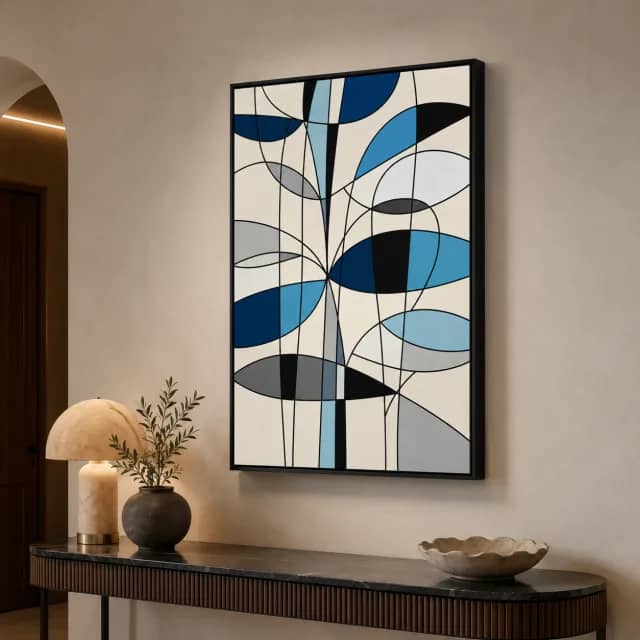Blue abstract canvas in a black frame above a slim console in a boutique entry
