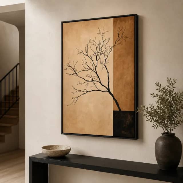 Modern tree canvas in a black frame above an elegant entry console
