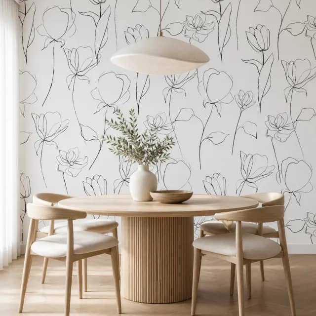 Floral line art mural in a minimalist dining room