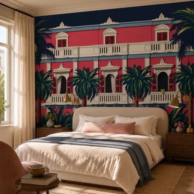 Boutique bedroom showing the coral facade palm mural behind the bed