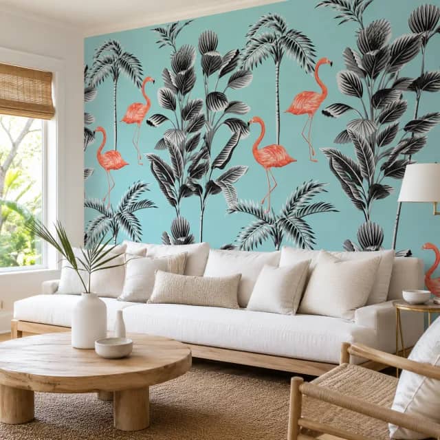 Aqua flamingo wallpaper installed on a coastal living room wall