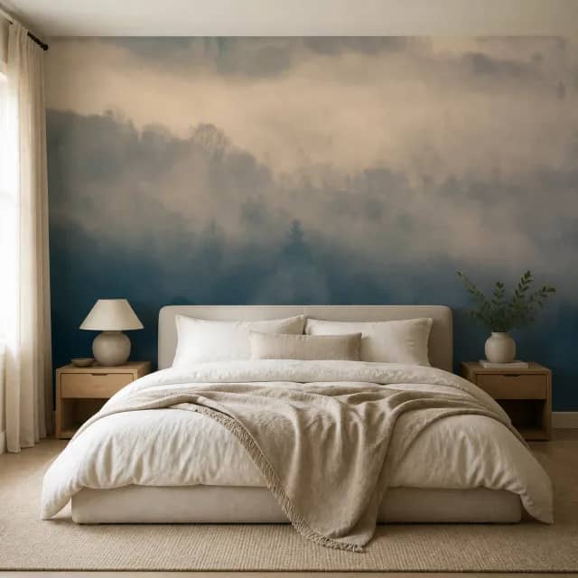 Serene bedroom with a misty forest mural behind the bed