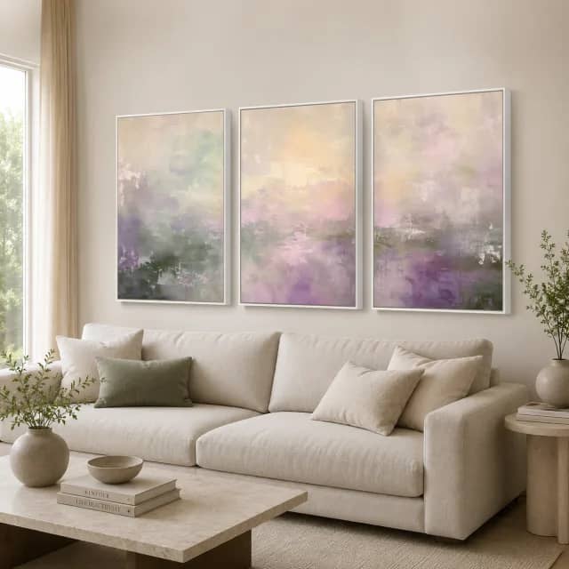 Pastel Mist Whispers above a light sofa in a contemporary living room with white frames