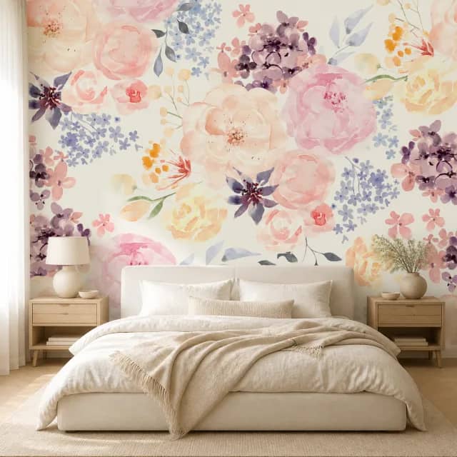 Pastel floral mural behind a bed in a bright bedroom