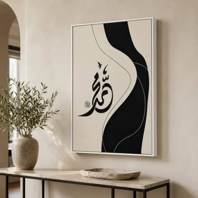 Stillness of Script in a white frame above a marble console in a calm entryway