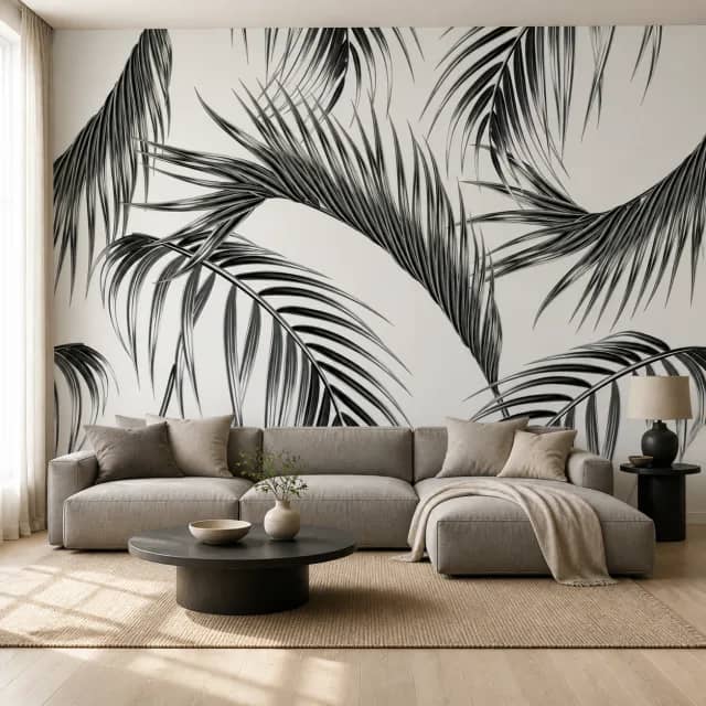 Monochrome palm fronds mural in a modern living room